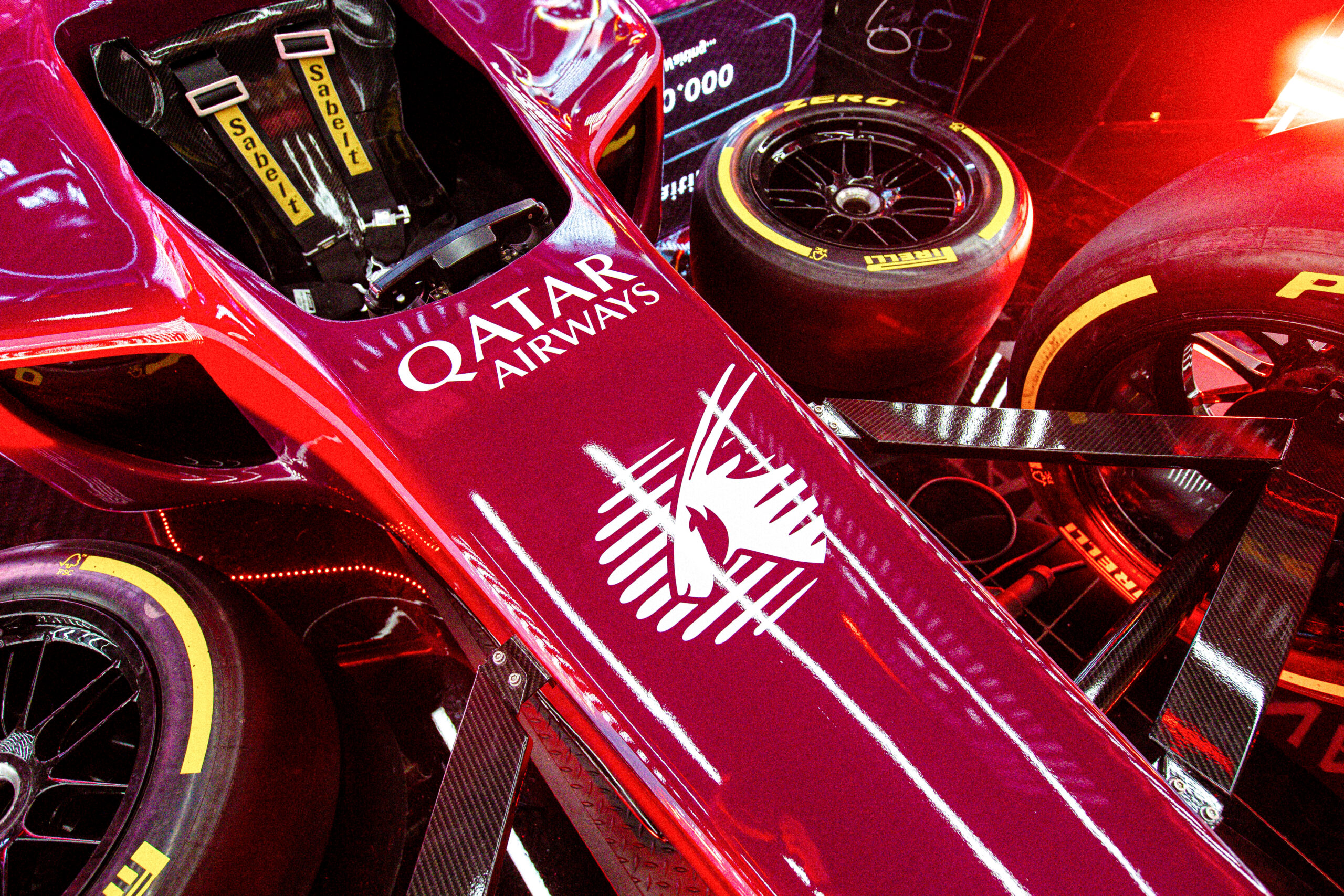 Qatar Airways Wrapped F1 Show Car for a Pitstop Challenge